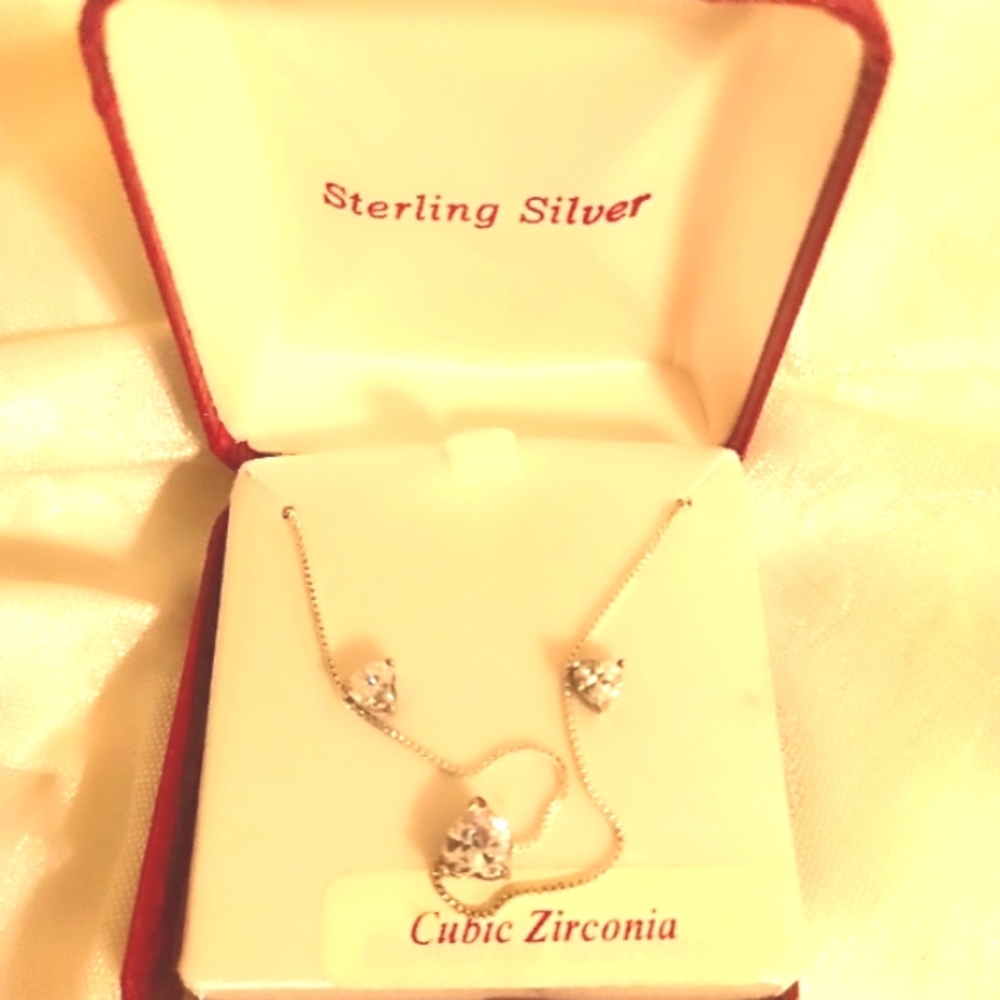 Cubic zirconia heart shaped sterling silver necklace and earrings set
